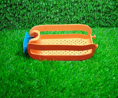 Plastic drain basket for sink, hanging on faucet