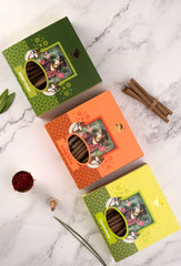 Combo of kesar, lemongrass, and tulsi dhoop sticks with rising smoke.